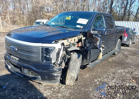 2023 Ford F-150 Lightning Lariat z USA, uszkodzony, nr VIN 1FTVW1EVXPWG10879